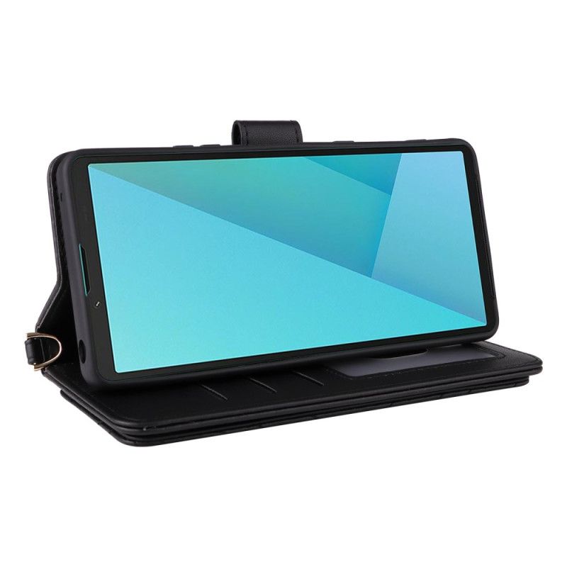 Δερματινη Θηκη Sony Xperia 10 Vii Καπιτονέ Με Λουρί Και Λουράκι Καρπού