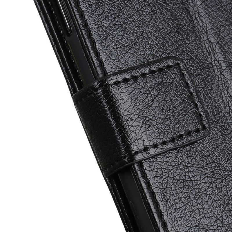Κάλυμμα Folio Xiaomi Redmi Note 10 / Note 10S Μαύρο Vintage Πριτσίνια Σε Στυλ Δέρματος Nappa